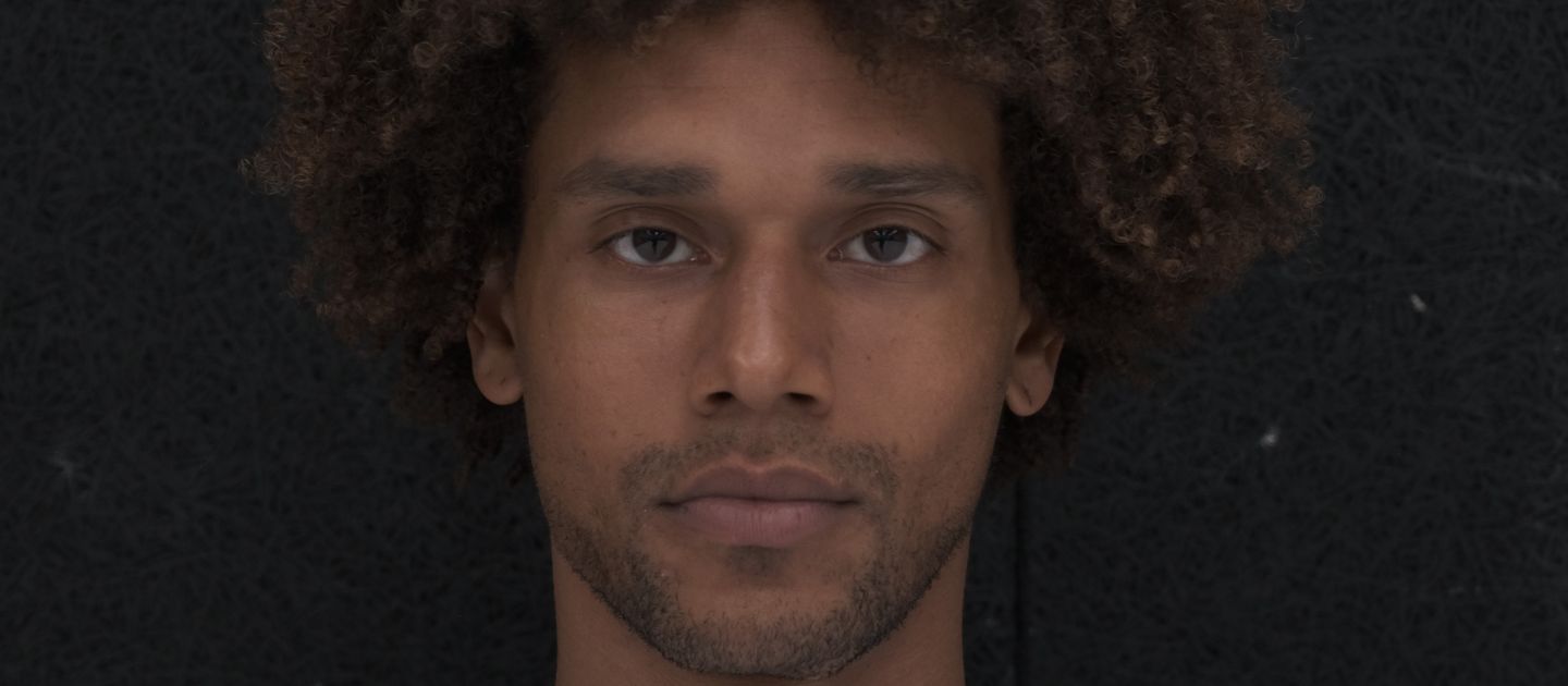 Ein Portraitfoto von Marcell Johnson