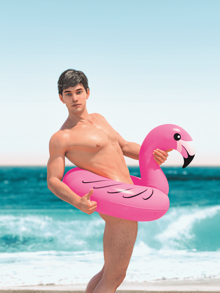 Auf dem Bild ist ein muskulöser Mann mit braunen Haaren am Meer, der einen Daumen nach oben zeigt. Er ist nackt bis auf einen pinken Flamingo-Schwimmring um seine Hüfte.