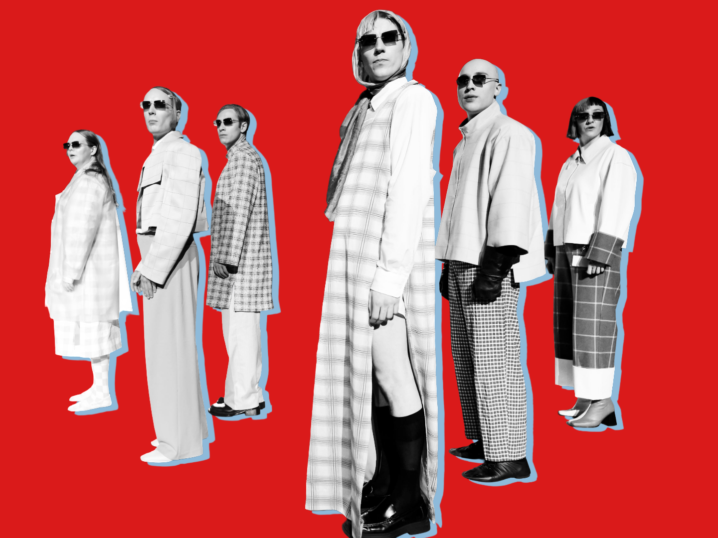 Das Ensemble steht in einer Formation, trägt Sonnenbrille und sieht sehr lässig aus.